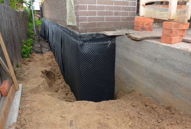 Happy homeowners after waterproofing job in Hendersonville
